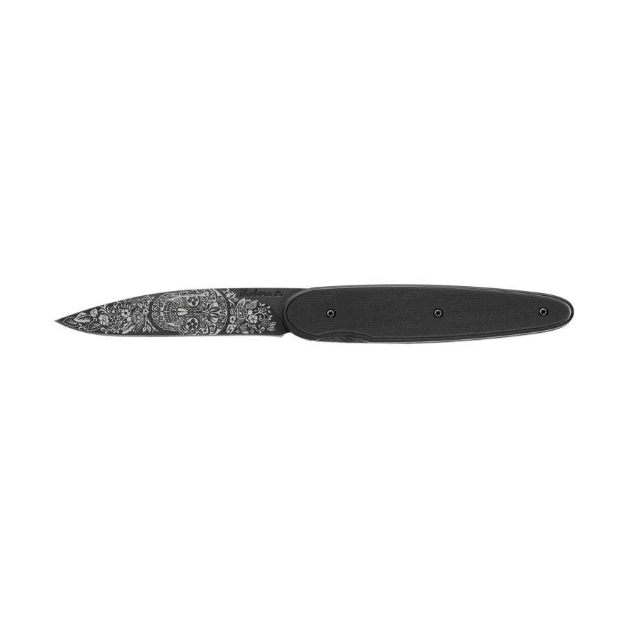 Couteau acier finition titane noir plaquette pleine résine g10 noir motif «tête mexicaine»