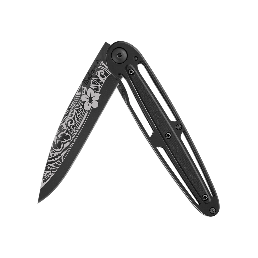 Couteau acier finition titane noir plaquette centrale résine g10 noir motif «polynésien»