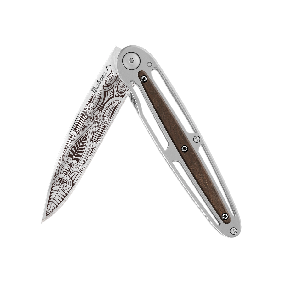 Couteau acier finition brillante plaquette centrale bois foncé motif «cachemire»