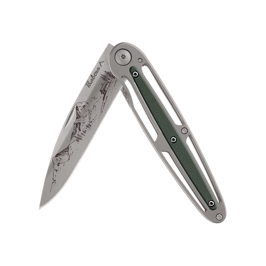 Couteau acier finition titane gris plaquette centrale résine g10 kaki motif «montagne»