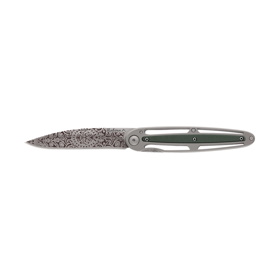 Couteau acier finition titane gris plaquette centrale résine g10 kaki motif «tiki»