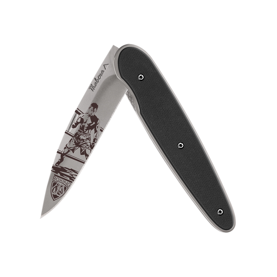 Couteau acier finition titane gris plaquette pleine résine g10 noir motif «boxeur»