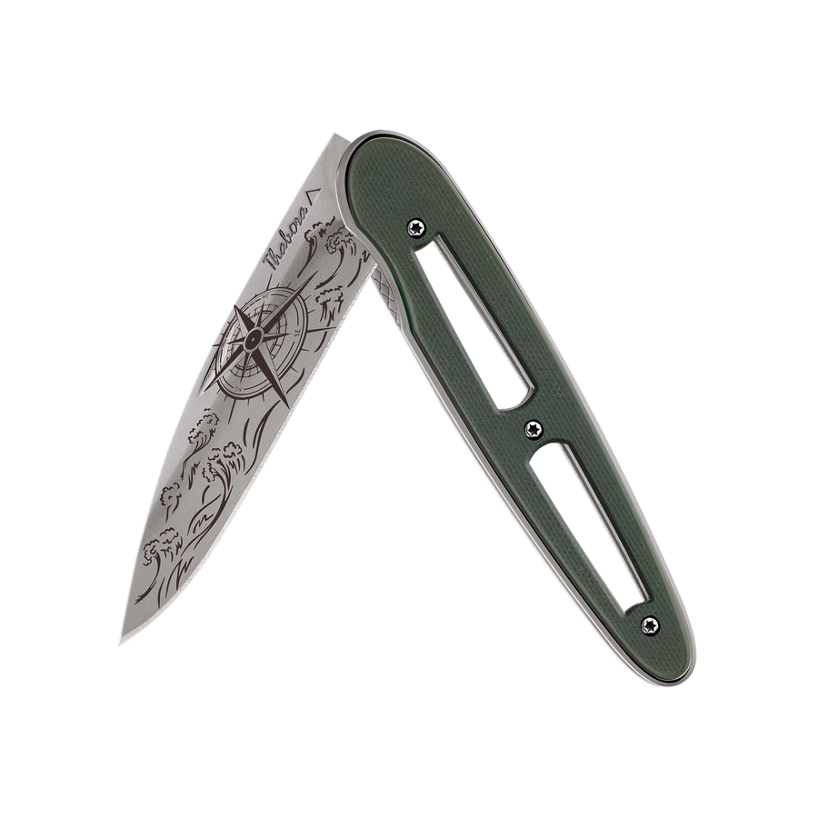 Couteau acier finition titane gris plaquette ajourée résine g10 kaki motif «navigation»