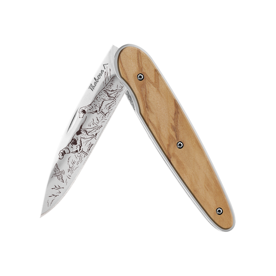 Couteau acier finition brillante plaquette pleine bois clair motif «chiens d'arrêt»