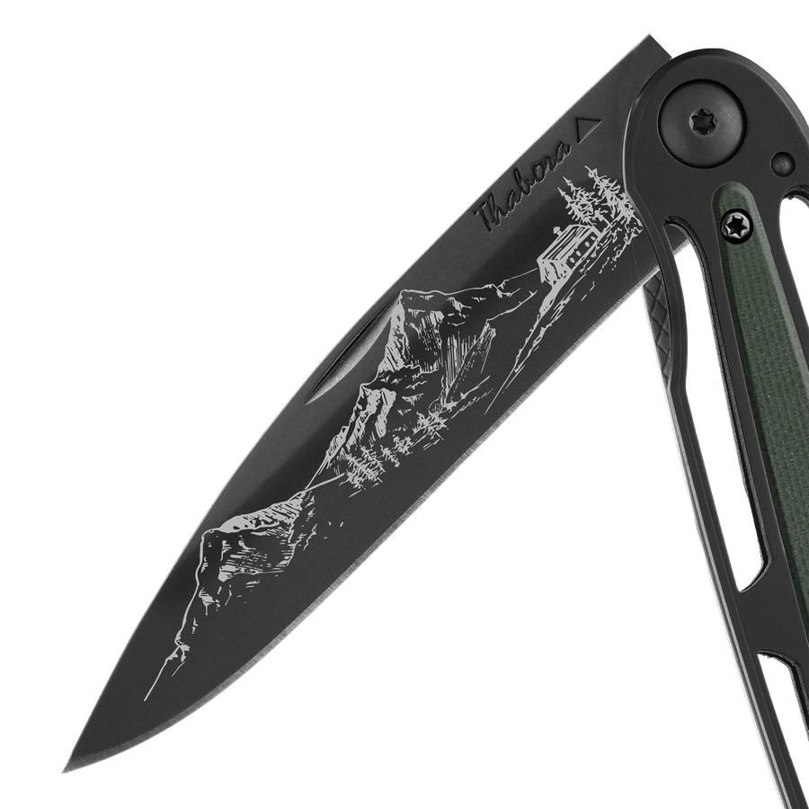 Couteau acier finition titane noir plaquette centrale résine g10 kaki motif «montagne»