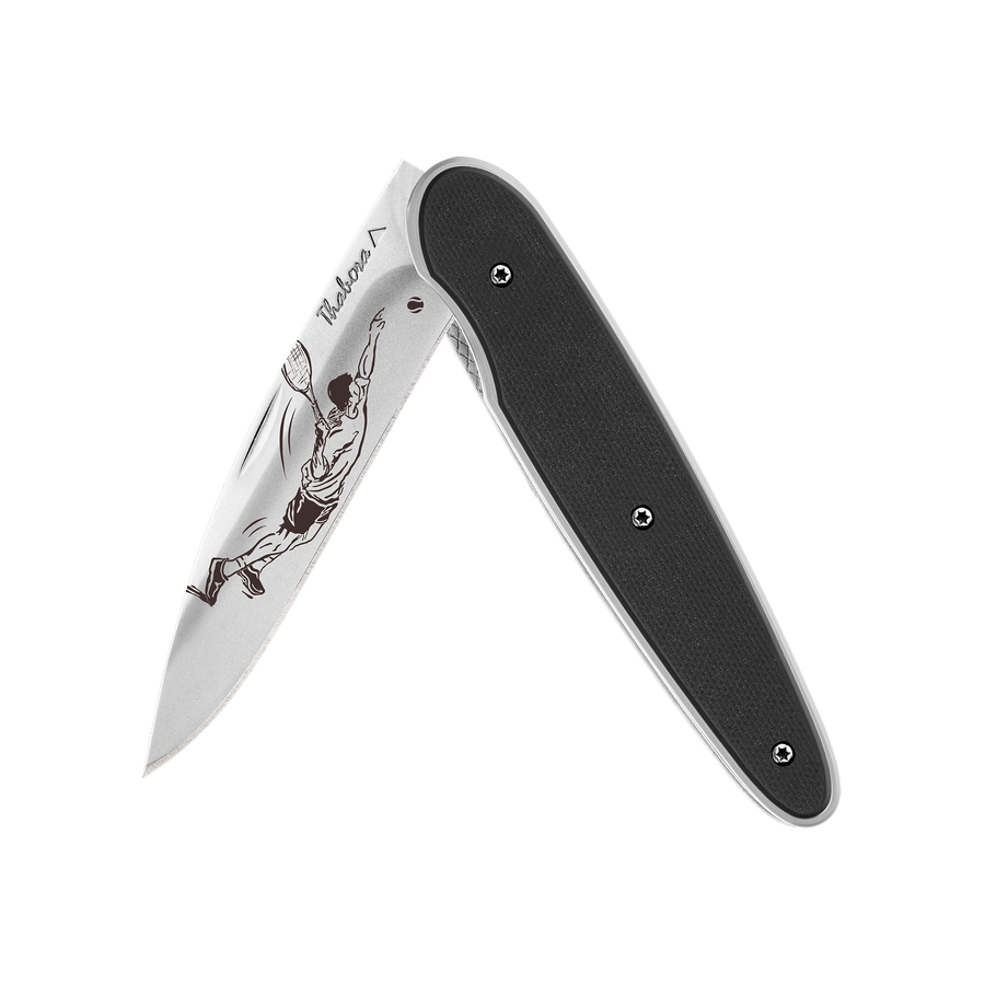 Couteau acier finition brillante plaquette pleine résine g10 noir motif «tennisman»