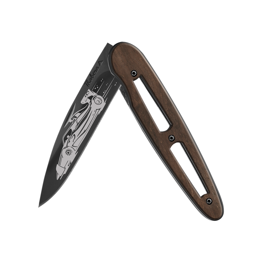 Couteau acier finition titane noir plaquette ajourée bois foncé motif «formule 1»