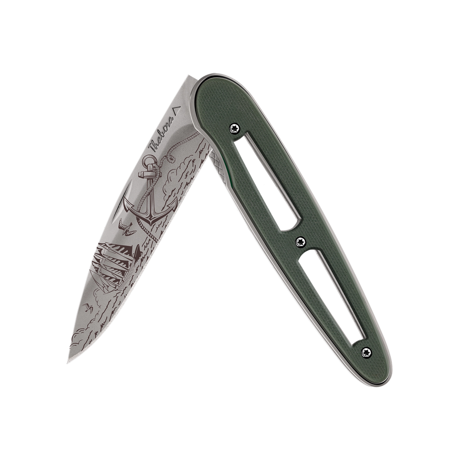 Couteau acier finition titane gris plaquette ajourée résine g10 kaki motif «océan»