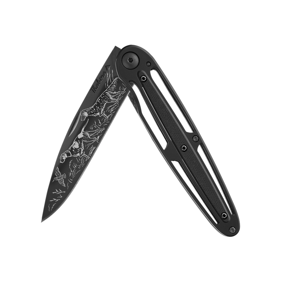 Couteau acier finition titane noir plaquette centrale résine g10 noir motif «chiens d'arrêt»
