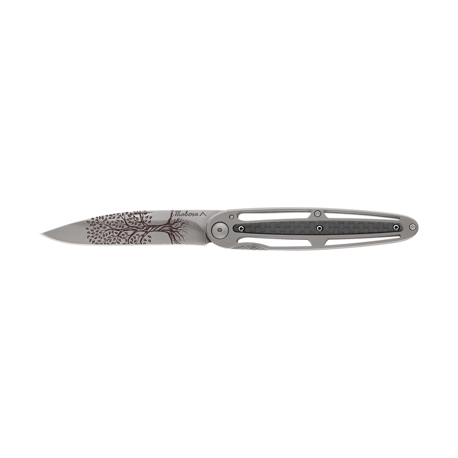 Couteau acier finition titane gris plaquette centrale carbone motif «arbre de vie»