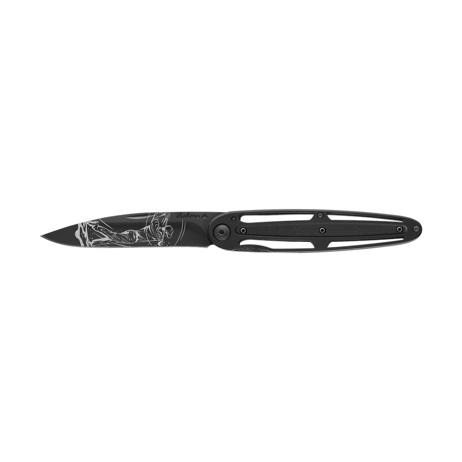Couteau acier finition titane noir plaquette centrale résine g10 noir motif «golfeur»
