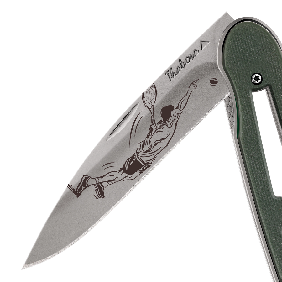 Couteau acier finition titane gris plaquette ajourée résine g10 kaki motif «tennisman»