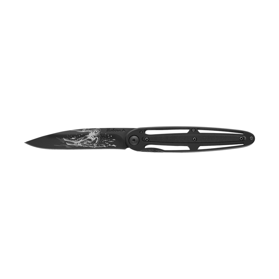 Couteau acier finition titane noir plaquette centrale résine g10 noir motif «skieur»