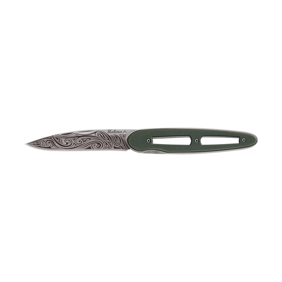 Couteau acier finition titane gris plaquette ajourée résine g10 kaki motif «volutes»