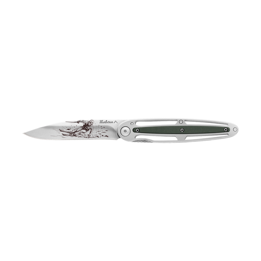 Couteau acier finition brillante plaquette centrale résine g10 kaki motif «skieur»