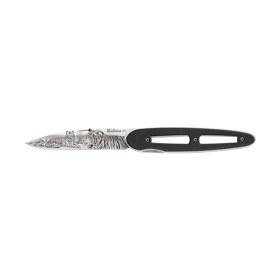 Couteau acier finition brillante plaquette ajourée résine g10 noir motif «tigres»