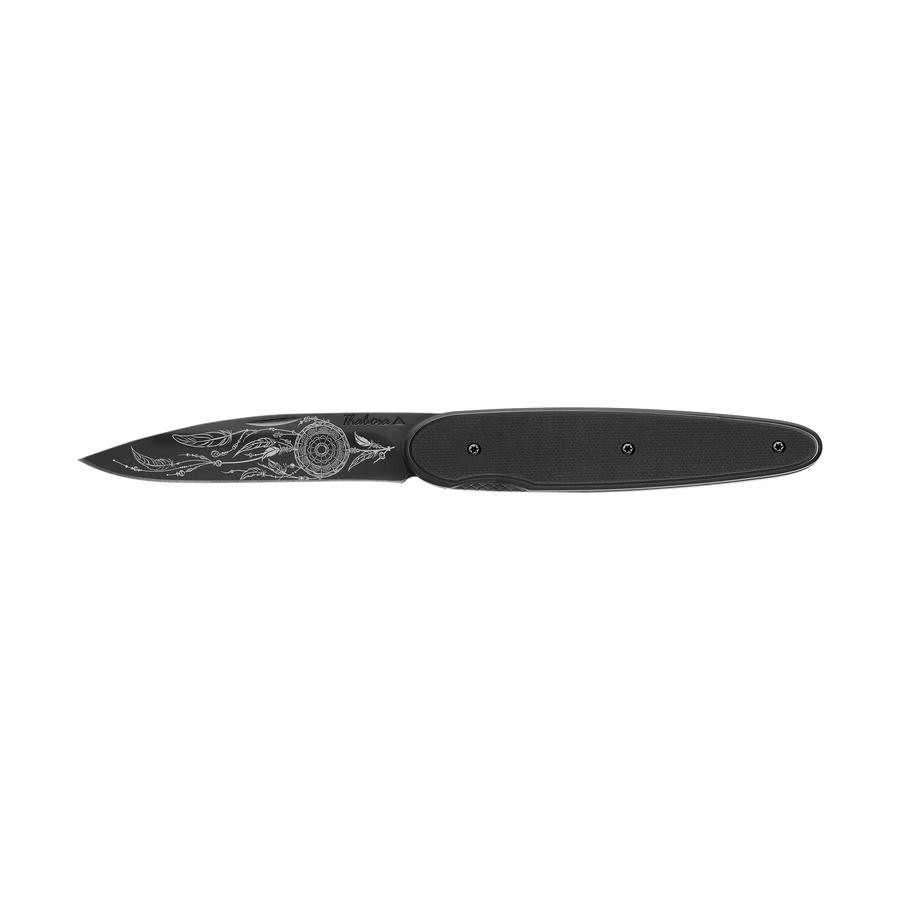 Couteau acier finition titane noir plaquette pleine résine g10 noir motif «attrape rêves»